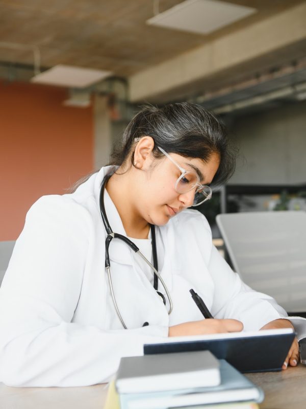 doctor-writing-in-a-journal